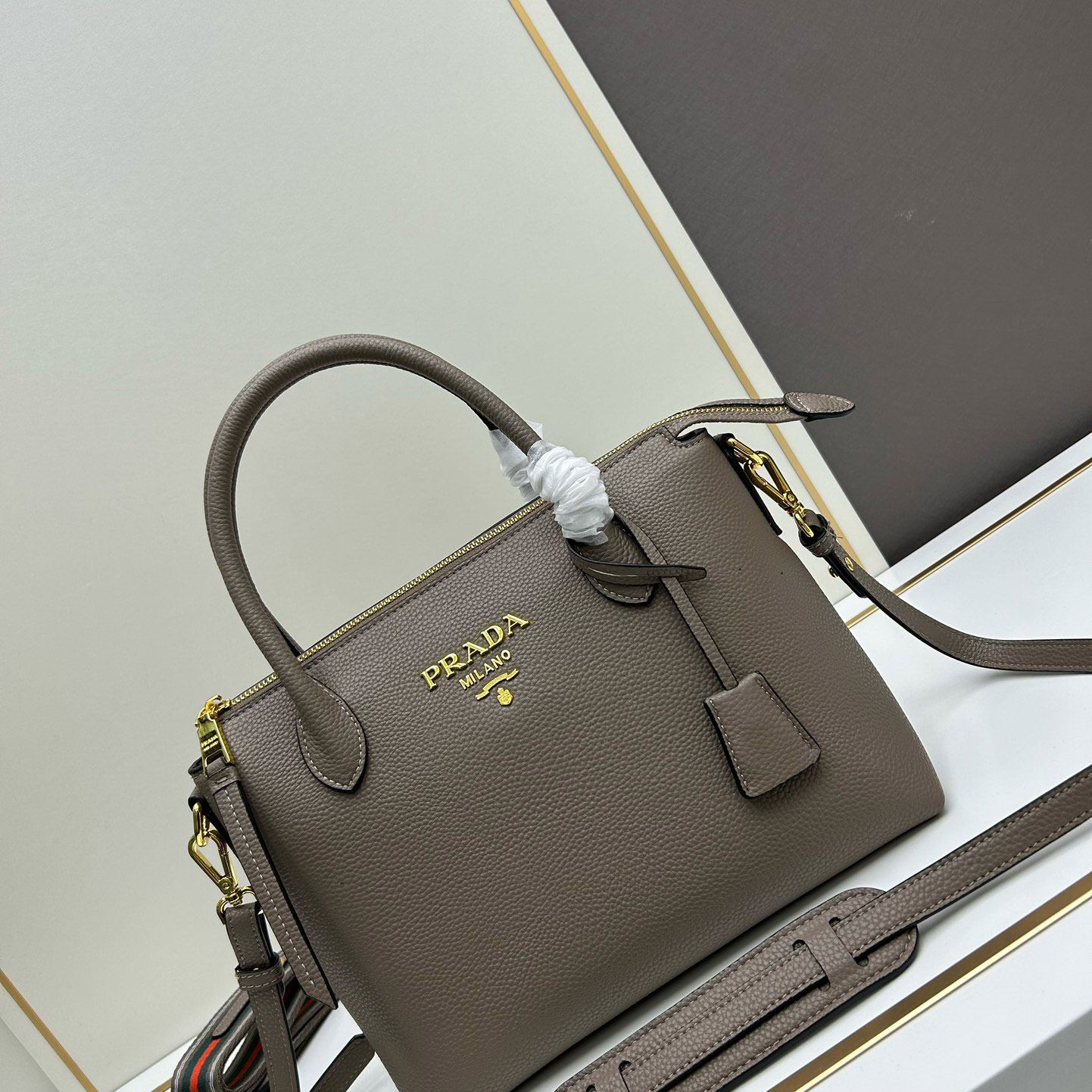 Pra*a top handle bags